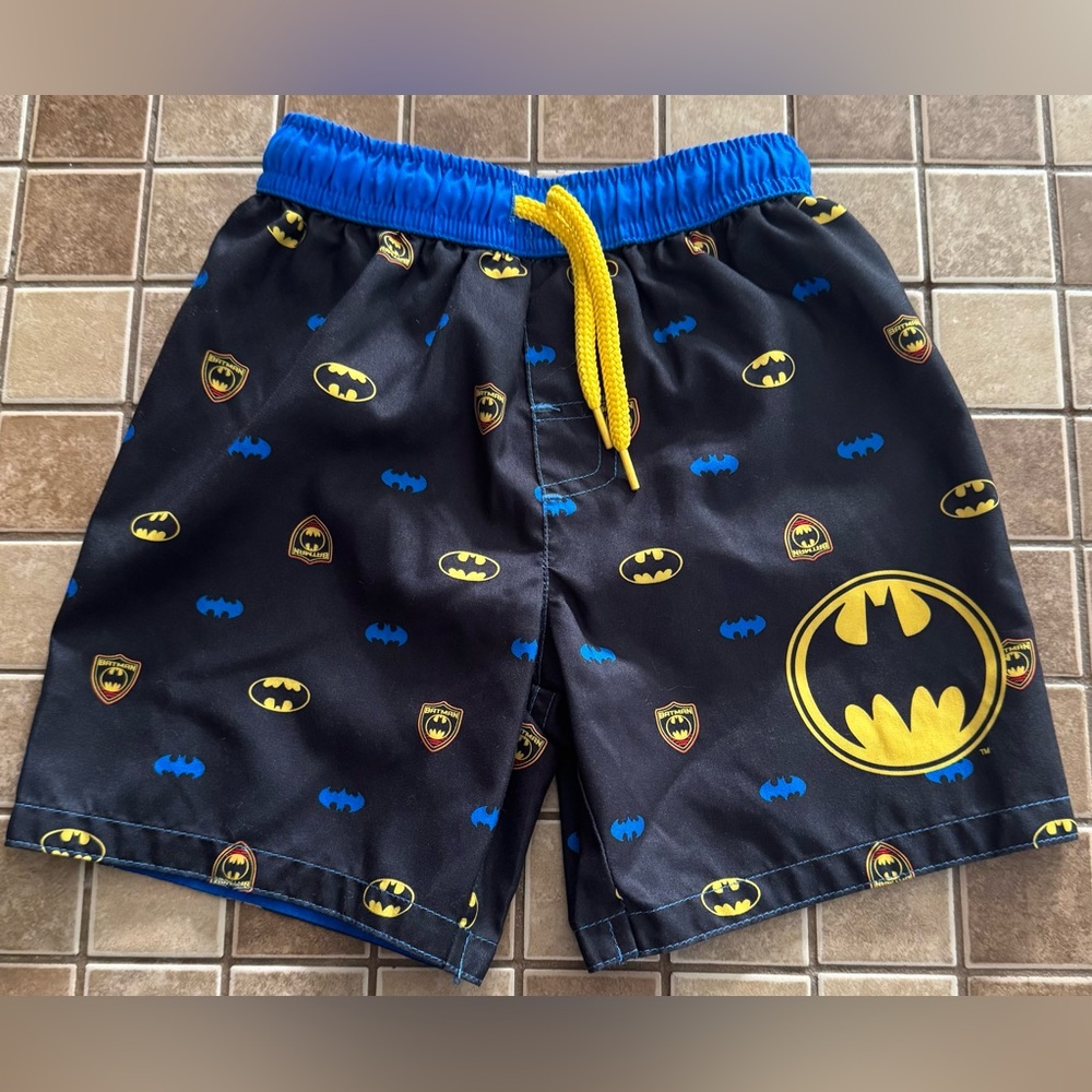 Blue and Black Swim Trunks with Batman Logo Pattern